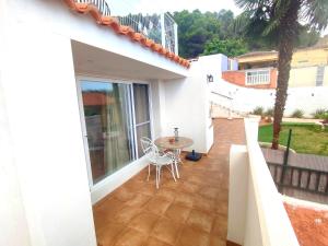 A balcony or terrace at VILLA FALCONERA APARTAMENTS, GANDIA a las faldas de la montaña