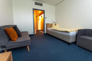 A seating area at Hotel Sommerhaus Linz
