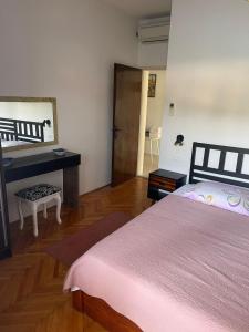 Postel nebo postele na pokoji v ubytování Makjanic Apartment