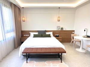 Postel nebo postele na pokoji v ubytování DOME Homestay