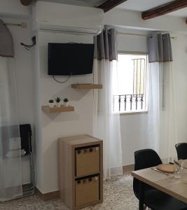 TV a/nebo společenská místnost v ubytování Casa de la Hoz
