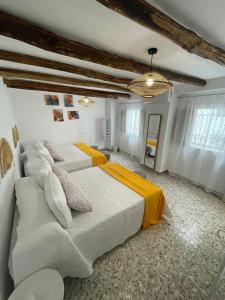 Postel nebo postele na pokoji v ubytování Casa de la Hoz