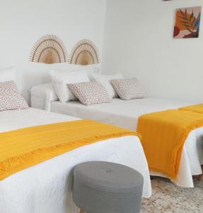 Postel nebo postele na pokoji v ubytování Casa de la Hoz