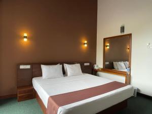 Letto o letti in una camera di The SkyDeck Kandy
