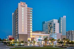 uma representação de um hotel numa cidade à noite em Marriott Fort Lauderdale Airport em Dania Beach