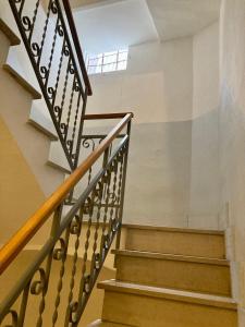 a set of stairs in a building at La Pomposa del Teatro in Modena