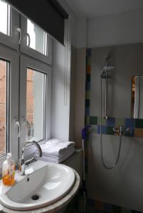 Koupelna v ubytování ROOMS BYTOM