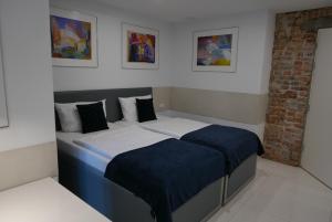 Postel nebo postele na pokoji v ubytování ROOMS BYTOM