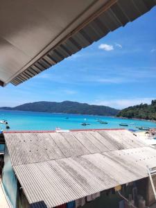 a view of the ocean from the roof of a building at OCEANBOYS INN in Perhentian Islands
