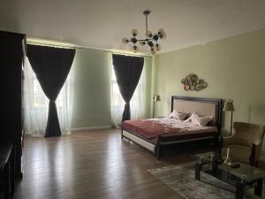 Säng eller sängar i ett rum på CozyFlat in the central Arad
