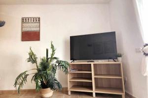 コスタ・デ・アンティグアにあるCASA CLAUDIO OCEAN VIEWのリビングルーム(テレビ付)