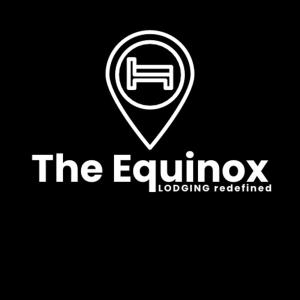 een logo voor de ezrow lader-instelling bij The Equinox Hotel in Bongaigaon