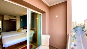 Łóżko lub łóżka w pokoju w obiekcie Hôtel Belle Vue et Spa