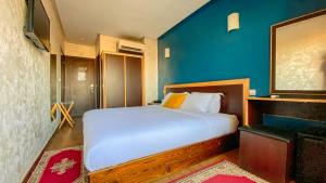 Łóżko lub łóżka w pokoju w obiekcie Hôtel Belle Vue et Spa