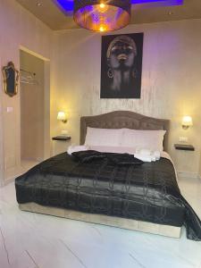 Letto o letti in una camera di LE CAMERE Luxury Rooms SIRACUSA