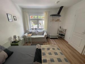 Χώρος καθιστικού στο Charmantes Häuschen mit Gästezimmer in Erfurt