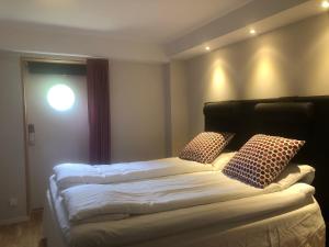 Voodi või voodid majutusasutuse Skulesjön Hotell toas