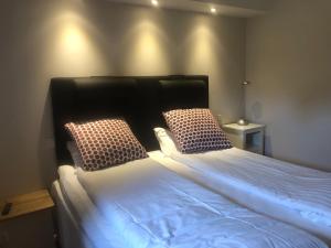 Voodi või voodid majutusasutuse Skulesjön Hotell toas