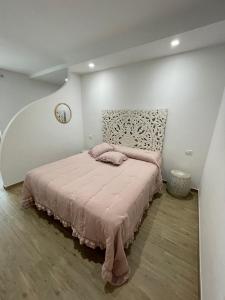 A bed or beds in a room at Masseria Paglieroni
