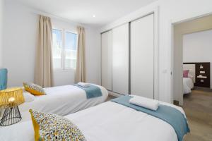 Ένα ή περισσότερα κρεβάτια σε δωμάτιο στο Ereza Villas Salitre +30 φωτογραφίες