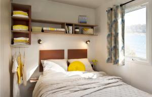 Ένα ή περισσότερα κρεβάτια σε δωμάτιο στο Elperhof Lodge 2