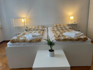 Postel nebo postele na pokoji v ubytování Villa Elza Appartment