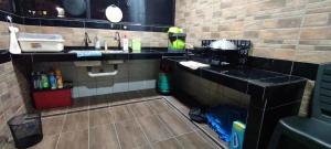 Kuchyň nebo kuchyňský kout v ubytování S99 HOMESTAY KUDAT