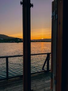 a view of the ocean from a boat window at Sandtorgholmen Hotel - Best Western Signature Collection in Harstad