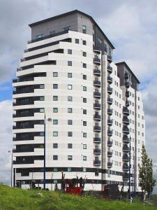 a large white building with balconies on the side of it at Amazing Views - 2 Bed - Parking - Central Bham in Birmingham