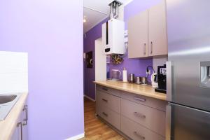 Kuchyňa alebo kuchynka v ubytovaní Apartament Lawendowy