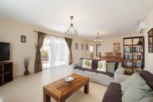 Χώρος καθιστικού στο Villa Jacaranda