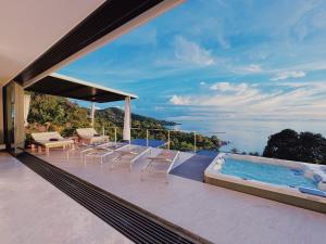 a villa with a swimming pool and a deck at Villa Valentin in Salad Beach