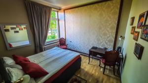 Postel nebo postele na pokoji v ubytování Villa Meretare