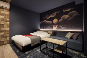 Postelja oz. postelje v sobi nastanitve ツルガナホテル-レジャーホテル-ラブホテル