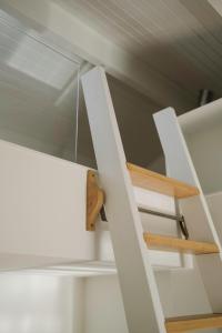 a staircase in a house with a mirror at Aldoar House in Porto