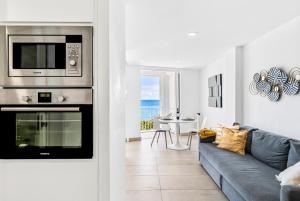 A kitchen or kitchenette at MEDANO4YOU Charly Blau