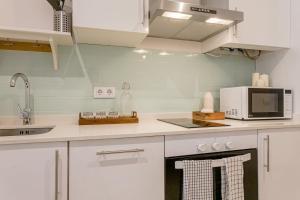 Dapur atau dapur kecil di El Rastro By SharingCo