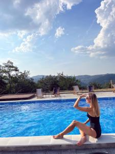 Bazén v ubytování Zdravkovac Country Club - Hotel nebo v jeho okolí