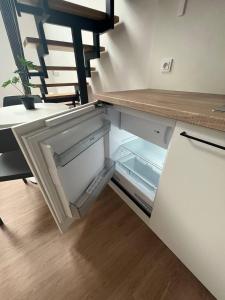 Palanda nebo palandy na pokoji v ubytování Mezonet - Postovska Centr Apartments
