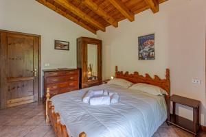Кровать или кровати в номере Baita Girasole Val Veny