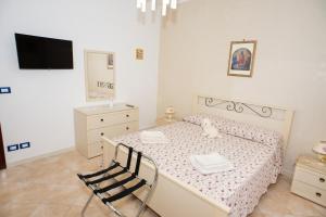 Postel nebo postele na pokoji v ubytování Casa Zibè