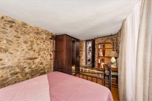 Voodi või voodid majutusasutuse Malsova Maisonette toas