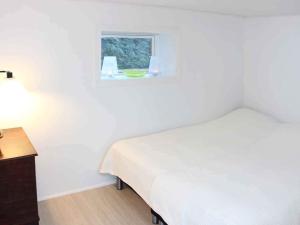 Ένα ή περισσότερα κρεβάτια σε δωμάτιο στο Holiday home Svaneke