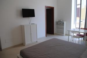 TV a/nebo společenská místnost v ubytování Enjoy Trani