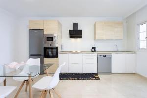 Virtuvė arba virtuvėlė apgyvendinimo įstaigoje Alojamiento acogedor y tranquilo