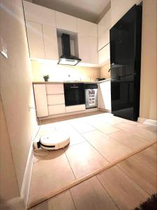a kitchen with a toilet in the middle of a room at Dona Tbilisi in Tbilisi City