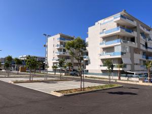 an empty parking lot in front of a building at Casa Giorgia Monopoli in Monopoli