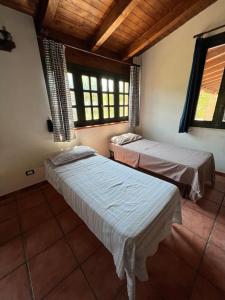 Katil atau katil-katil dalam bilik di Villa Sanzone