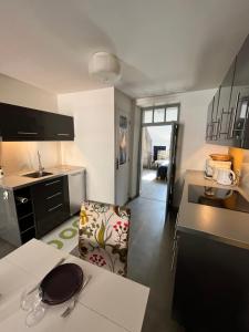 Kuhinja oz. manjša kuhinja v nastanitvi Appartement 2 à 4 pers, Remparts de Guérande