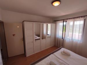 Posteľ alebo postele v izbe v ubytovaní Apartment Stanka-Rab